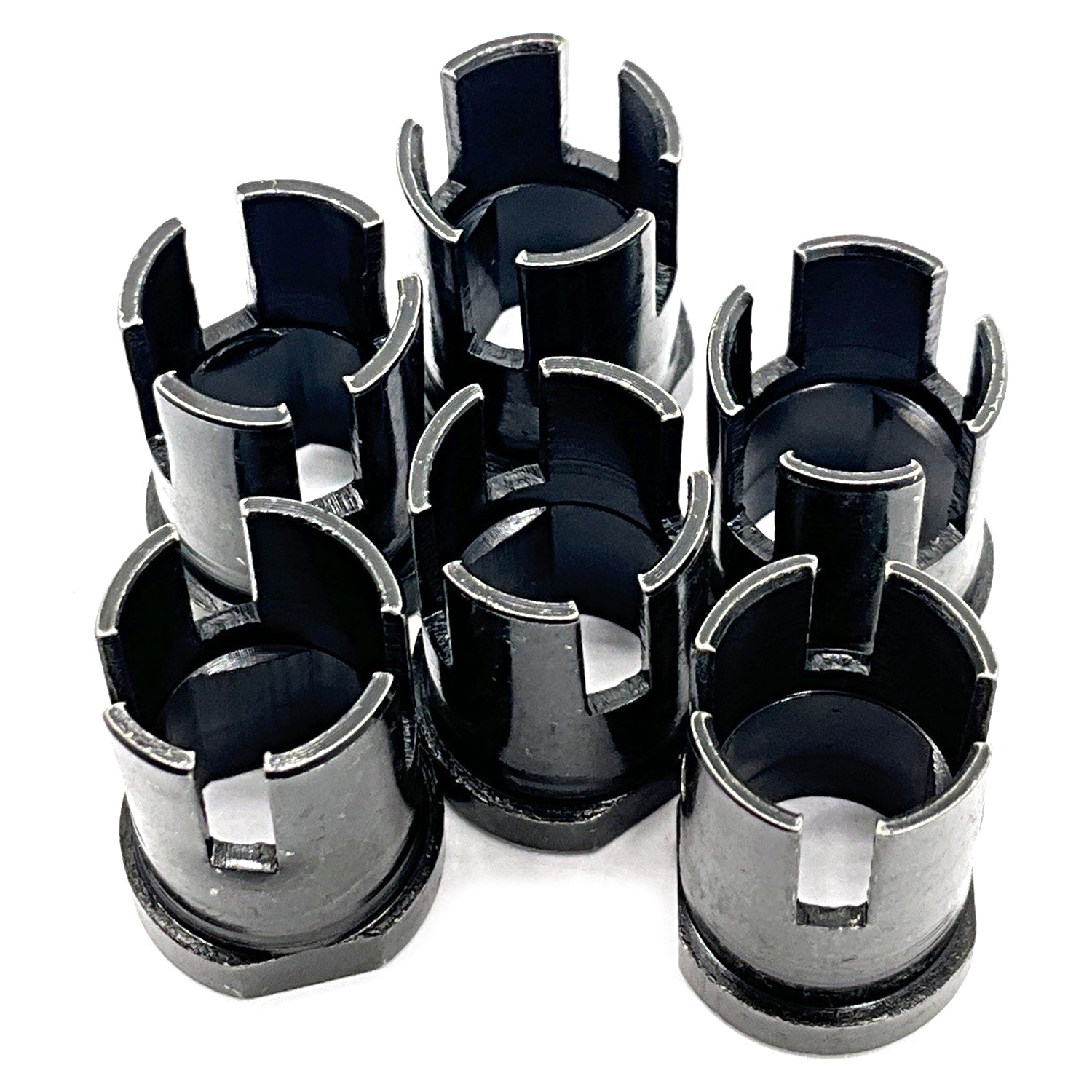 Set of six black cylindrical metal rock slider hardware pieces with split openings and mounting bases.