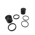 Two black cylindrical front caliper pistons with four black rubber seals of varying sizes arranged on a white background.