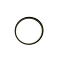 Black metal piston ring with textured surface and uniform circular shape.