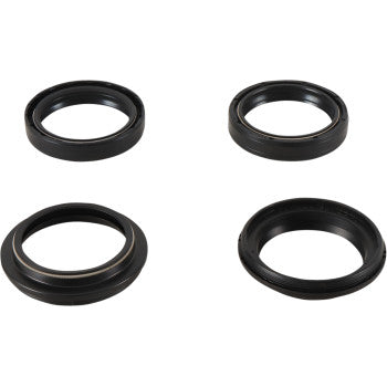 Set of four black rubber fork and dust seals for motorcycle suspension, varying in thickness and design.