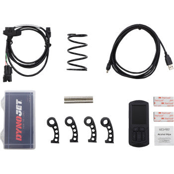 Kawasaki Stage 2 Power Package Kit with black wiring harnesses, metal spring, small black control device, metal tube, and.