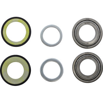 Six round mechanical parts from the Steering Stem Bearing Kit by Moose Offroad, including rubber-sealed bearings, metal washers, and tapered roller bearings, are arranged in two columns and three rows on a white background.