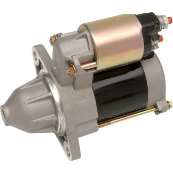 Metal Kawasaki starter motor with silver housing, black cylindrical body, and gold solenoid attached.