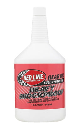 A white plastic 1-quart (946 ml) bottle of Red Line Heavy Gear Oil, featuring a red and black label, is designed for use in transmissions and differentials.