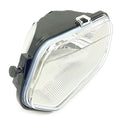 Left side Polaris headlight with clear ribbed lens and black housing.