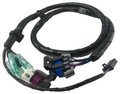 Black motorcycle rear wiring harness with a coiled protective sleeve, colored connectors, and mounting plugs.