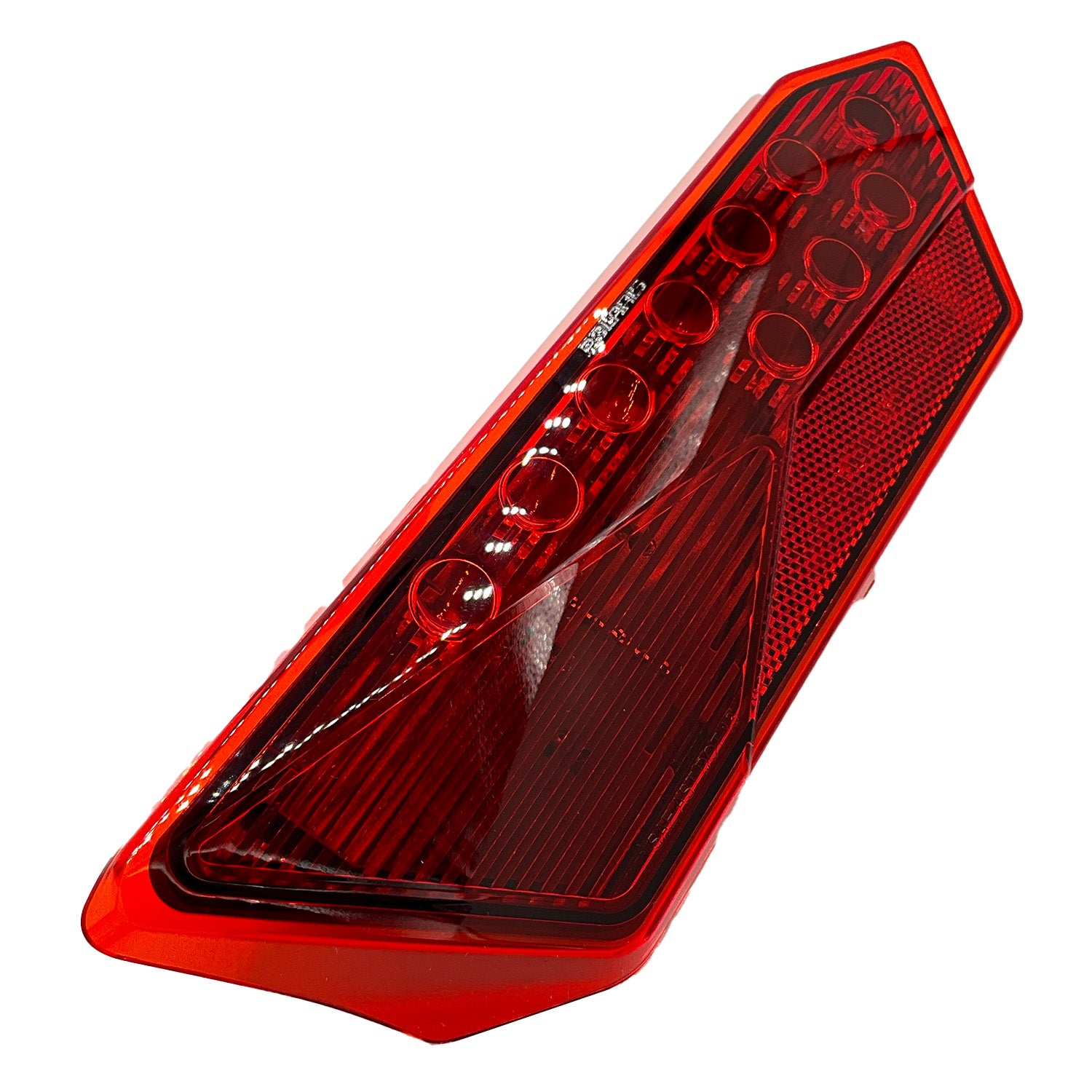 Angular red plastic Polaris left taillight with clear sections and internal bulb details.