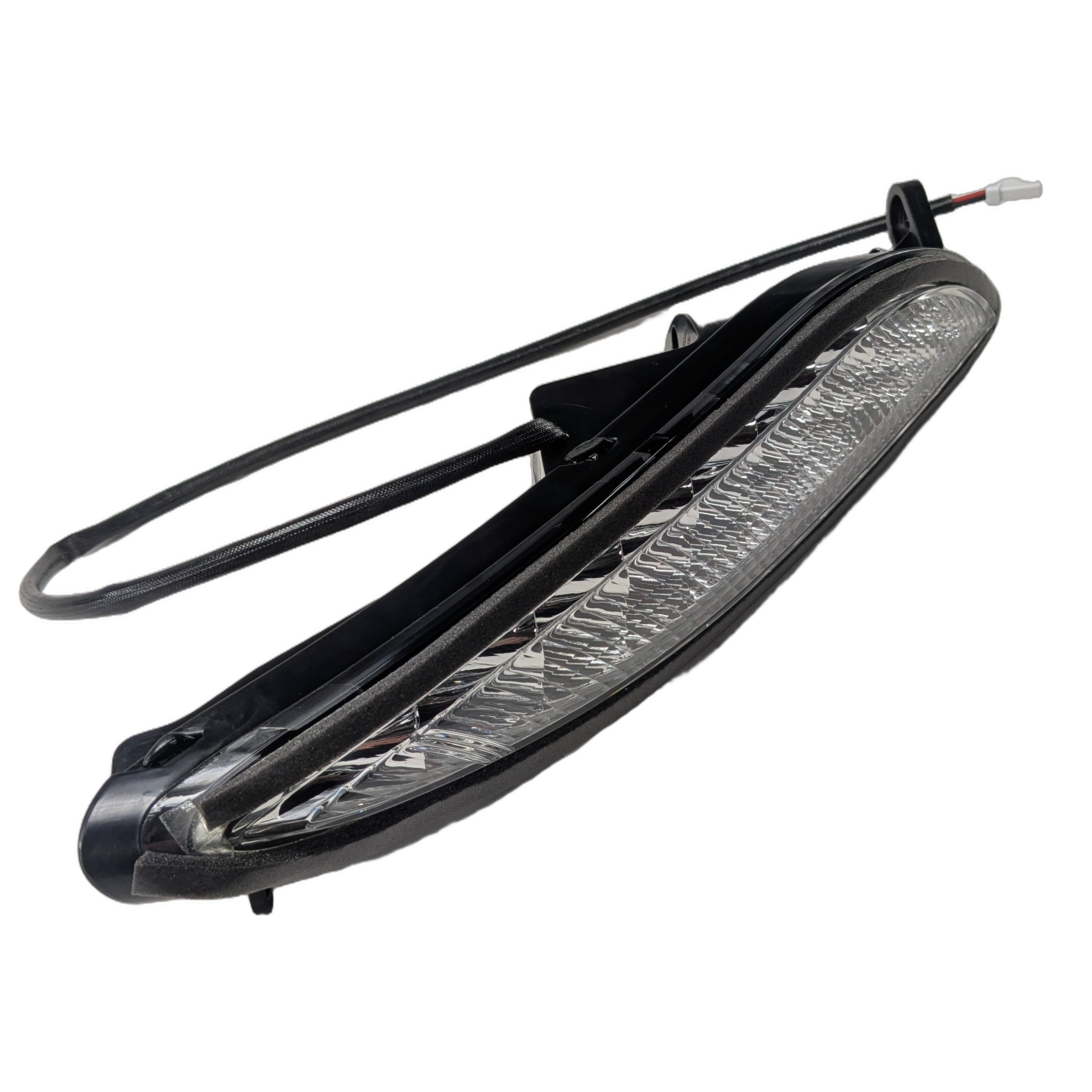 Right-side motorcycle turn signal with clear lens, black housing, and attached wiring harness.