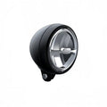Round black motorcycle fog light with silver crossbar and mounting bracket at base.