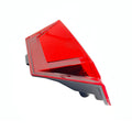Red triangular Polaris taillight with decal, angled design, plastic housing, automotive replacement part.