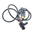 Black cylindrical speed sensor with attached black cable and multi-wire connector plug.