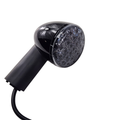 A close-up of the Asm-Tsgnl Led Rr Stt Ece LH Black by Polaris, featuring a sleek black finish and modern design, shown isolated on white—reflecting the signature style of OEM Indian Polaris parts.
