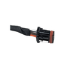 Black cylindrical audio connector with orange rubber seal and braided black wire sheath.