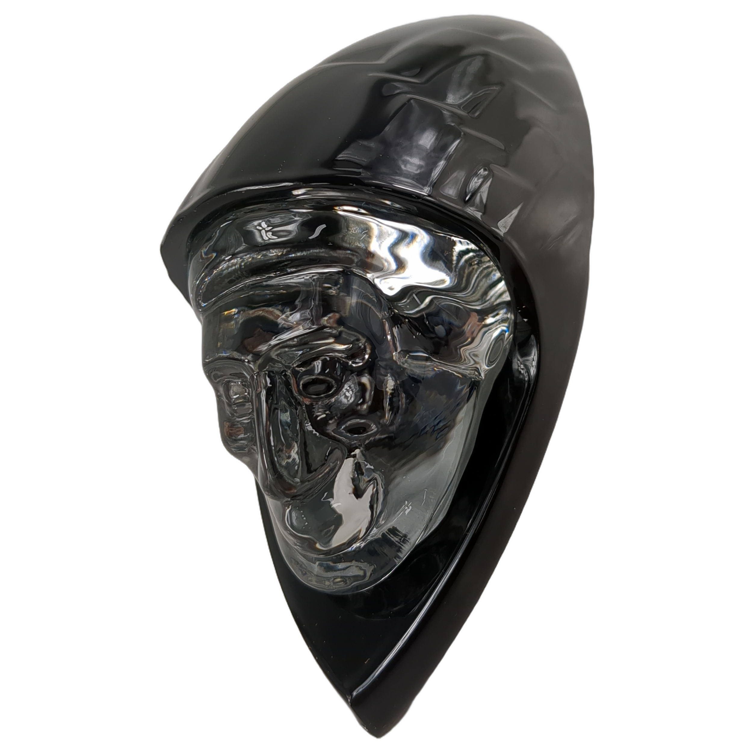 Glossy black motorcycle fender headdress with sculpted chrome skull face detail.