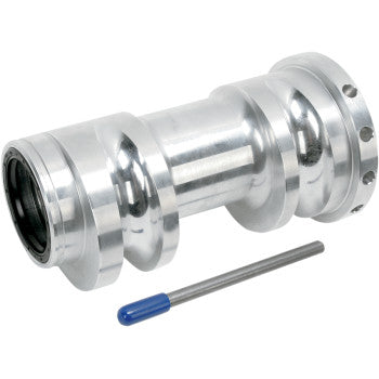The Axle Carrier Super Twin by Lone Star Racing is a shiny metal cylindrical component with ridges, flanges, high-performance seals, and a blue-tipped slim rod—displayed together on a white background.