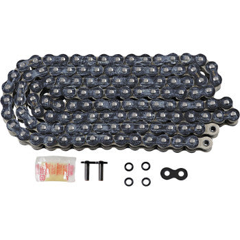 The 525 Max X Drive Chain 150 Links Black & Chrome by RK is displayed with two pins, a black connector link, four O-rings, and a small lubricant packet, all neatly arranged on a white background.
