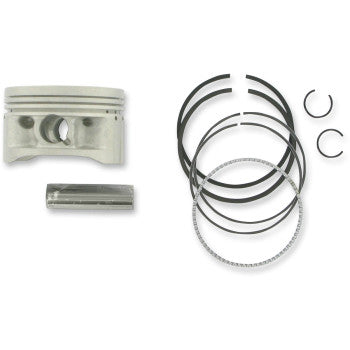 The Yamaha Piston Kit 83.50 mm by Prox includes a precision-machined OEM replacement piston, wrist pin, piston rings, and two circlips, all arranged neatly on a white background.