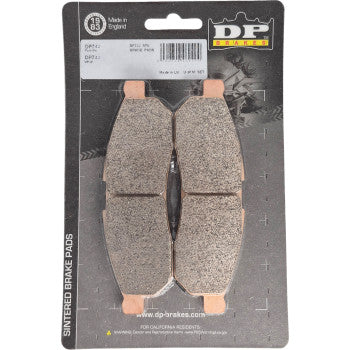 A retail pack of Polaris Sintered Brake Pads XD1 by DP Brakes is shown on a gray backing card, featuring two sintered metal pads side by side with product information printed at the top.