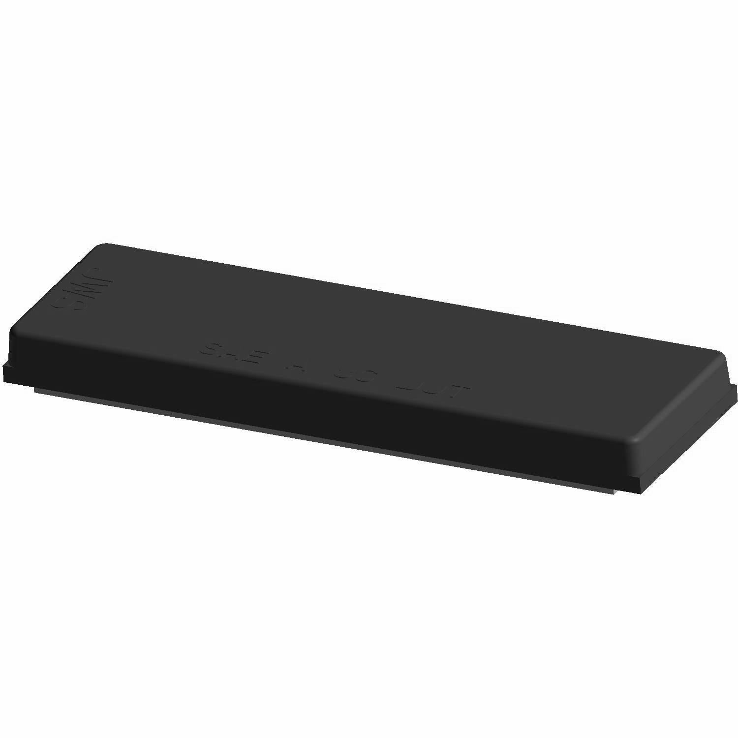 Black rectangular plastic reflector cover with a smooth matte finish and slightly raised edges.