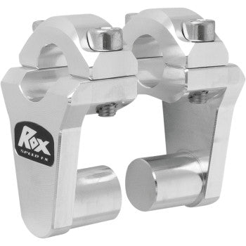 A pair of Rox Speed FX Pivoting Handlebar Risers 7/8" Bar Clamps 2", made of metal with a robust design and secure fitment bolts, is shown on a white background. Made in the USA.