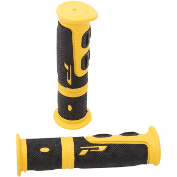 Two 964 Evo Grips Yellow / Black by Pro Grip are shown, featuring textured surfaces, raised oval patterns, a stylized P logo, and a durable, tear-resistant rubber-compound inner layer for enhanced comfort and grip.