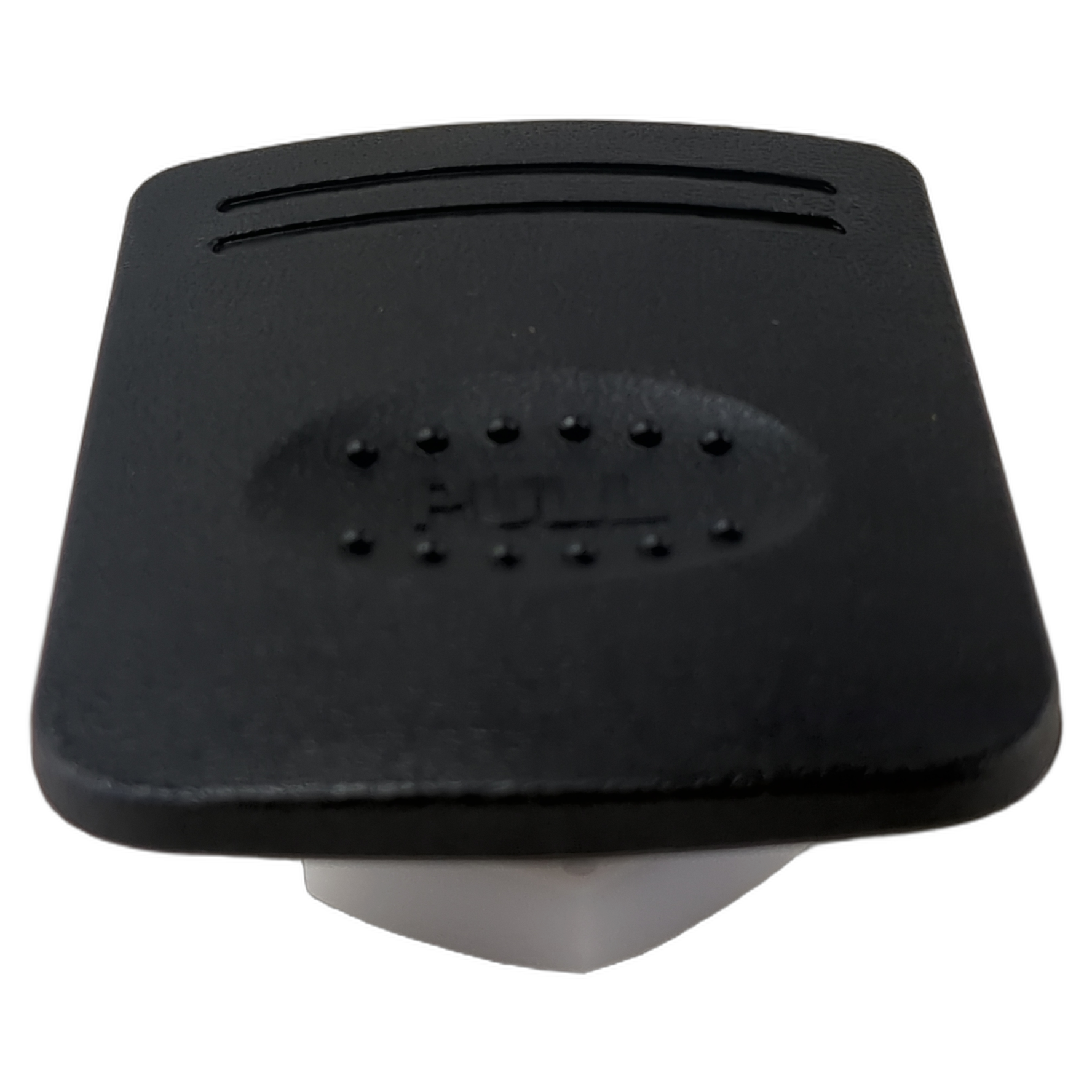 Black rectangular push-style door lock button with textured grip and white base.