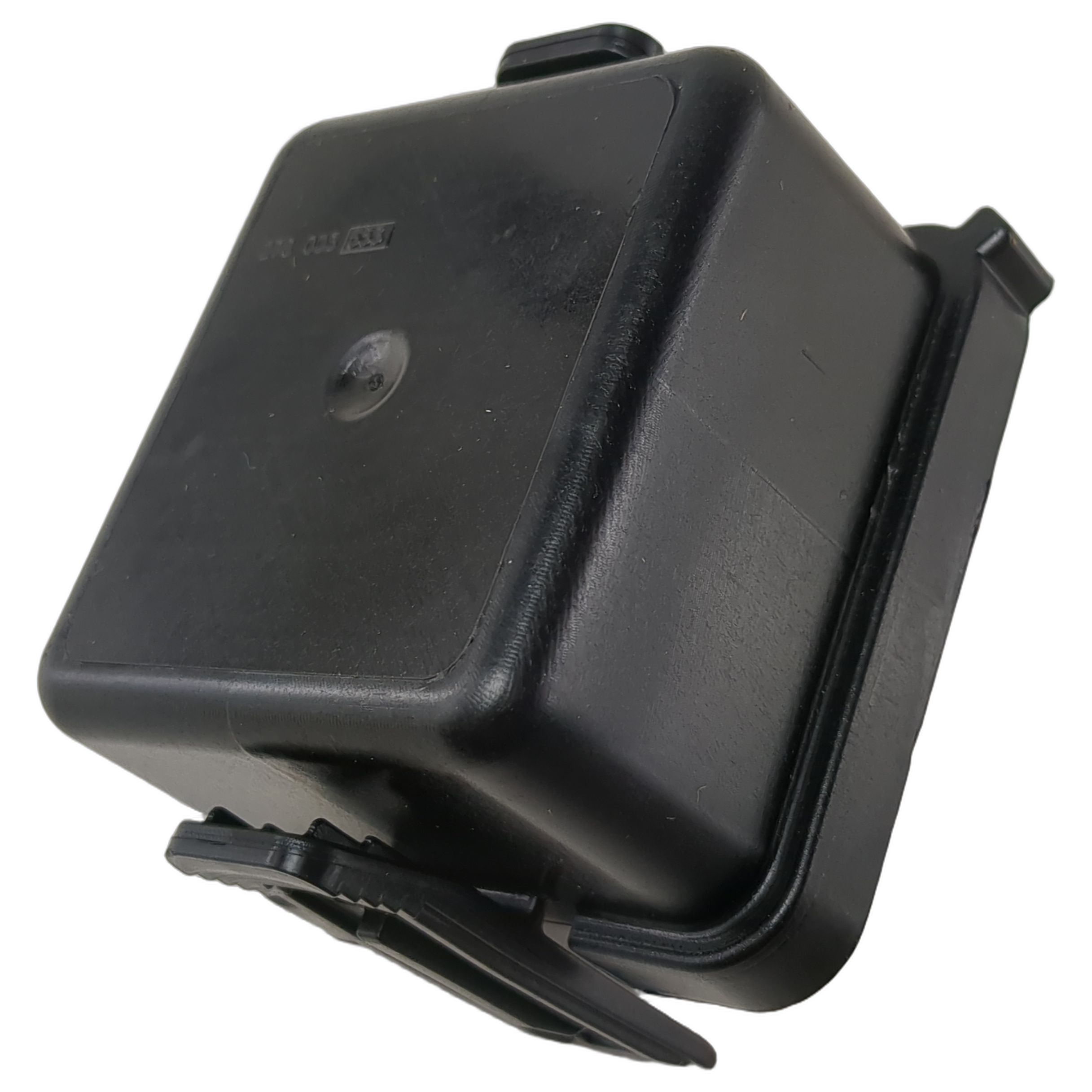 Black rectangular plastic fuse cover with snap-on latch and smooth surface.