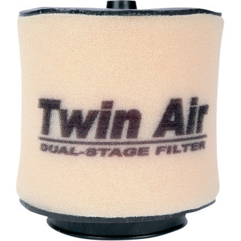 The Honda Standard Air Filter by Twin Air is a beige, cylindrical filter with dual-stage, dual-bonded foam and black printing reading "Twin Air Dual-Stage Filter." Black edges are visible on both the top and bottom.