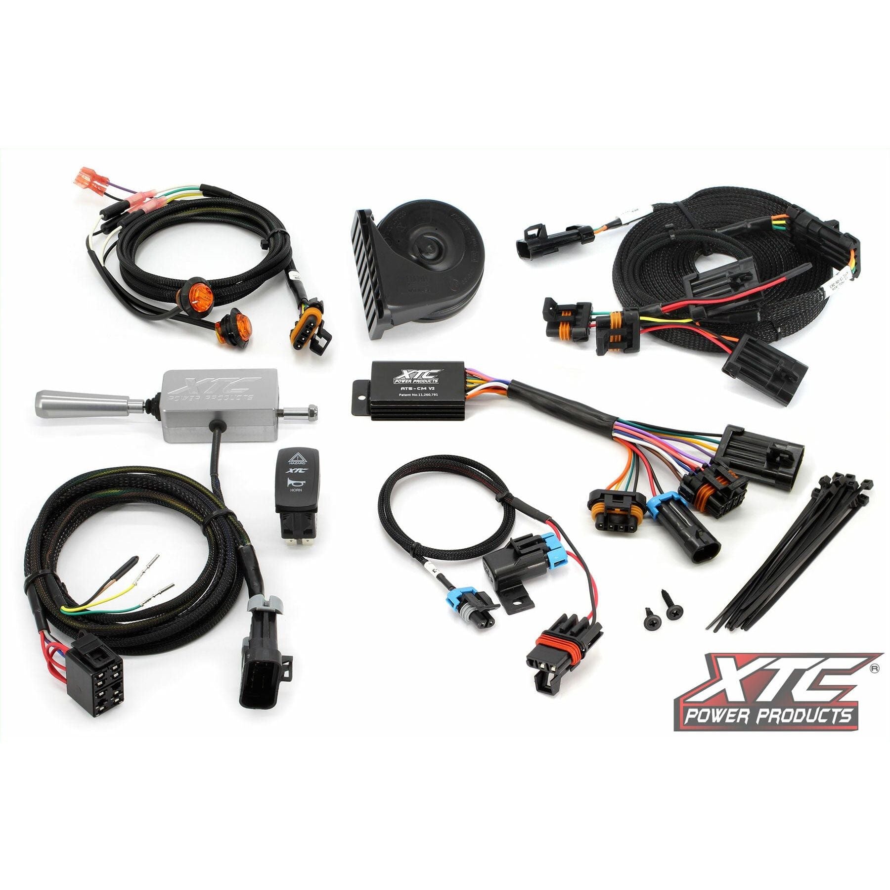 The Auto Turn Signal Kit W/Billet Column Lever by XTC Power includes cables, connectors, a relay, switches (with a billet turn lever for self-cancel blinkers), horn, zip ties, screws, and control modules—all on display with the XTC Power Products logo.