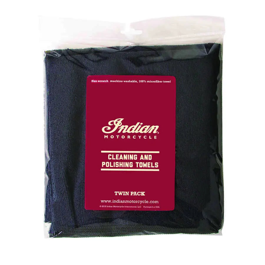 The Super Plush M/F Towel Twin Pk by Polaris includes two black towels in a clear bag with a red label—ideal for motorcycle care with quality OEM Parts accessories.