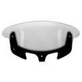 Smoke-tinted motorcycle windshield with curved flare design and mounting holes.