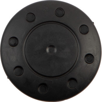 The Wheel Cap by Camso is a round, black, flat accessory with a raised center and eight evenly spaced circular indents around its matte, smooth edge.