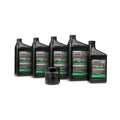Five black plastic containers of Polaris PS 4 motor oil with green and white labels, including four 1-quart bottles and one.
