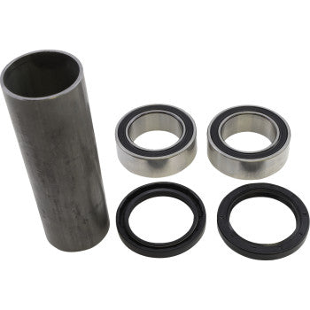 The Yamaha YFZ Carrier Rebuild Kit Super Twin by Lone Star Racing includes a metal cylindrical spacer, two ball bearings, and two black rubber seals—essential parts for maintaining or rebuilding carrier bearing housings.