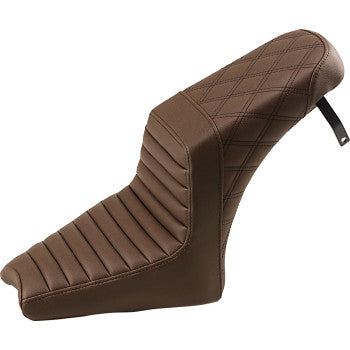 A brown Saddlemen Step-Up Seat – Front Tuck-n-Roll / Rear Lattice Stitch – for Scout 2018-2024, with retro styling, raised backrest, and rear strap.