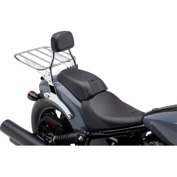 A close-up of the Detachable Backrest - Chrome by Cobra installed on a motorcycle seat, featuring a chrome luggage rack and highlighting its fit for Chieftain or Cobra models with a sleek, dark-colored design.