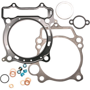 Metal and rubber gaskets of varied shapes with copper washers and blue bolts for Yamaha engine assembly.