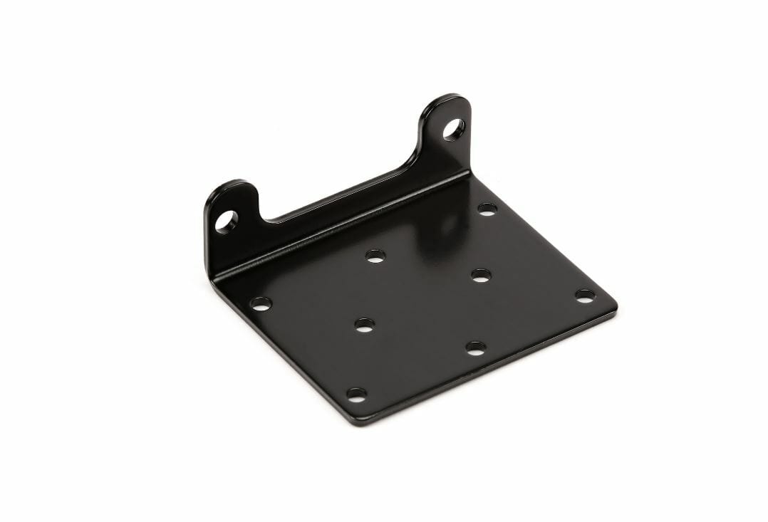 The ATV Winch Fairlead Mounting Plate by Warn is a black metal bracket featuring multiple holes on its base and two upright flanges with attachment holes, designed for securing or supporting winch fairleads.