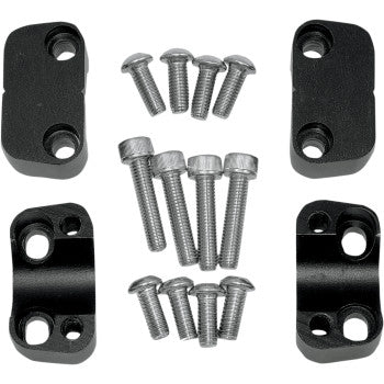 Four black Powermadd Oversize Handlebar Clamp Adapters, each with two screw holes, are arranged around twelve silver bolts of assorted lengths—perfect for ATV or snowmobile handlebars—displayed on a white background.