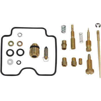 Varied brass carburetor parts, black rubber gaskets, metal springs, and washers arranged flat on white background.