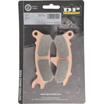 A package of Kawasaki Sintered Brake Pads Ridge Ranch Front Right by Dp Brakes is shown on a black backing card. These copper-colored ATV pads have gray friction surfaces for reliable performance and clear product branding.