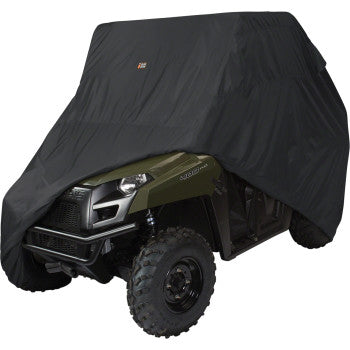 A green all-terrain utility vehicle is partially covered by the Classic Accessories UTV Storage Cover Black Large, leaving the front and side wheels and part of the front body exposed for weather protection.