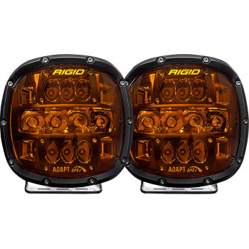 Pair of round Rigid Industries Adapt XP LED lights with black housing and amber lenses, featuring multiple LED bulbs and.