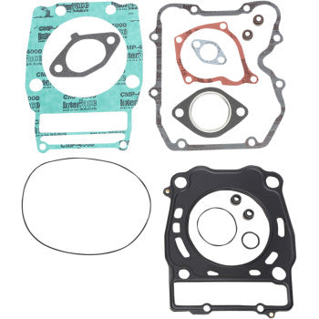 The Polaris Complete Motor Gasket Kit by Moose Offroad features assorted green, red, and black gaskets with various holes and cutouts, perfect for any engine rebuild. Made in the USA.