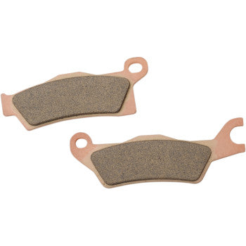 Pair of copper-colored sintered brake pads with dark friction surfaces, designed for off-road use.