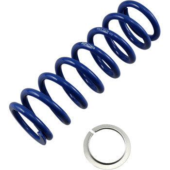 A Race Tech Shock Spring Front & Rear Blue Sport Series, rated at 300 lb/in, sits beside a heat-treated flat circular metal ring with a gap.