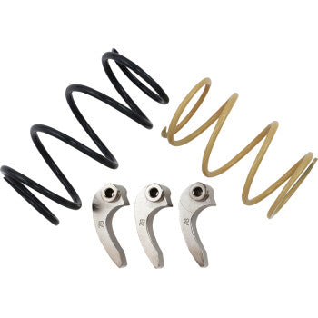 The Clutch Kit by Epi includes two metal coil springs, one black and one gold, ideal for low-range acceleration or trail riding, displayed above three small, silver, curved metal pieces with holes on a white background.