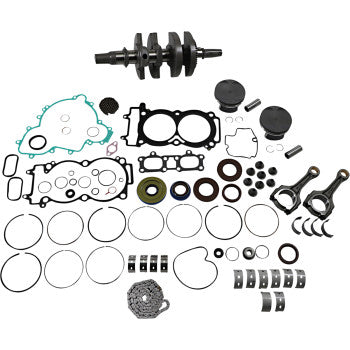 Complete Polaris engine rebuild kit with black crankshaft, assorted metal piston rings, gaskets, seals, and connecting rods.