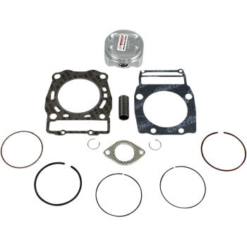 The Polaris Piston Kit with Gaskets 92.50 mm by Wiseco includes a piston kit, piston rings, gaskets, and other small parts, all arranged neatly on a white background.