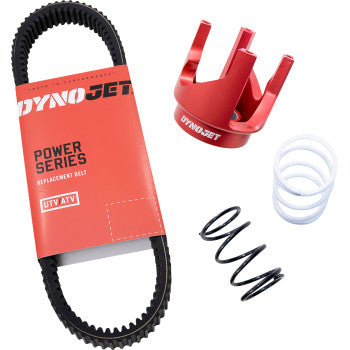 A Defender Grip N Rip Clutch Kit HD by Dynojet—complete with a UTV/ATV belt, a red aluminum part, and two springs (white and black)—is displayed on a white background.